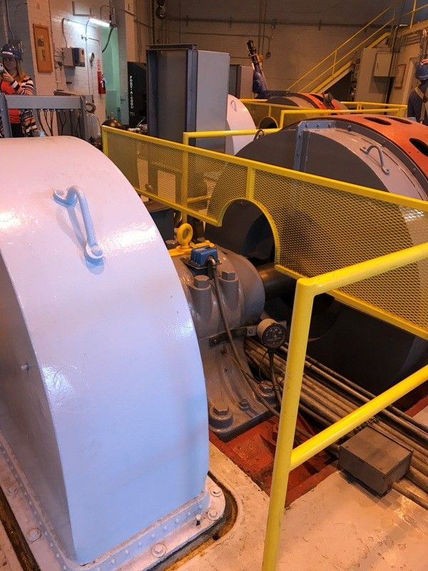 A Manitou Hydro Plant Pelton Turbine Shaft Connected to a Generator