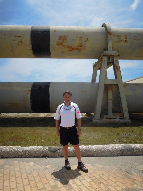Trey Walters in 2013 in front of pipes that delivered water to the Space Shuttle launch pad
