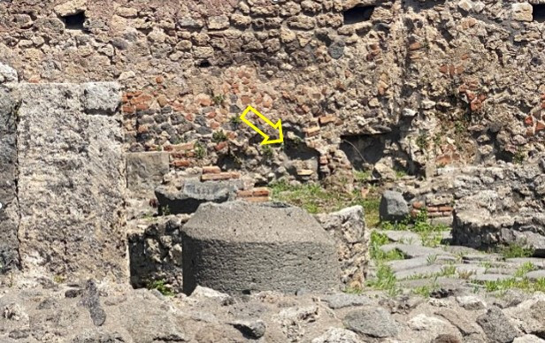 Figure 1a.   A photo I took in Pompeii, Italy, on April 24 of a wall with a lead pipe protruding. 