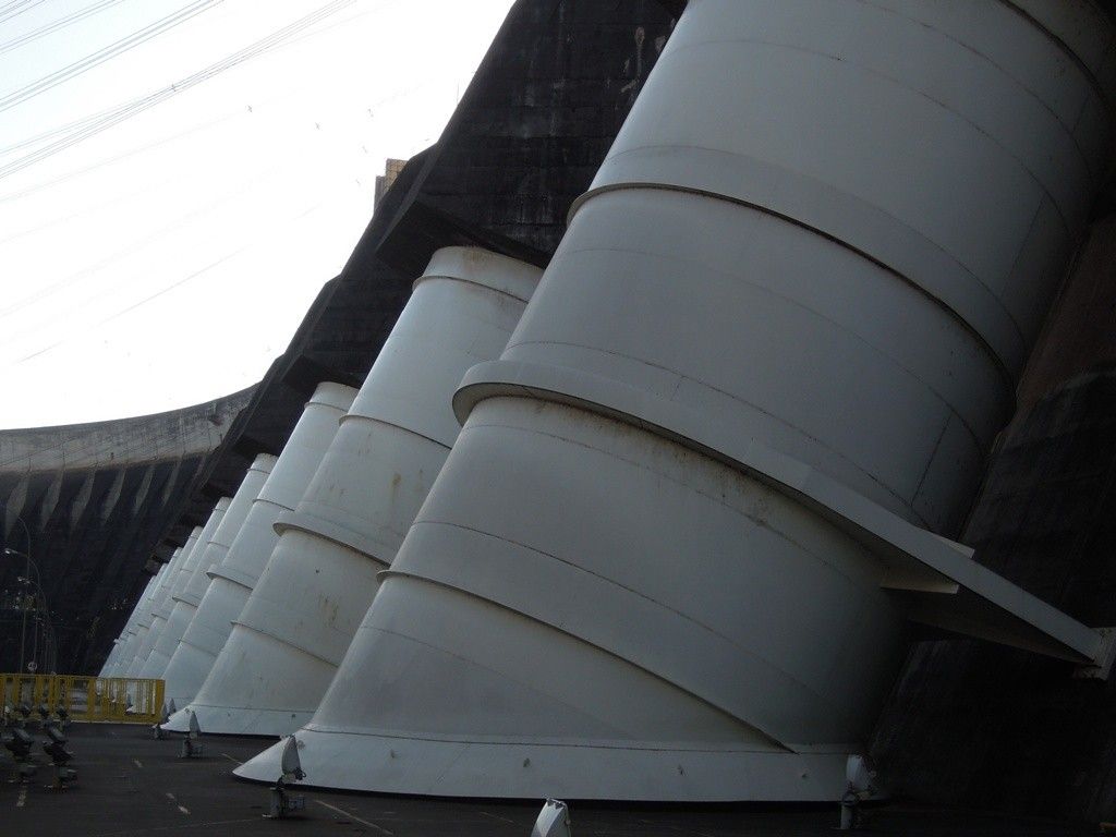 Row of 10 meter (33 ft) diameter penstocks which feed the turbines below
