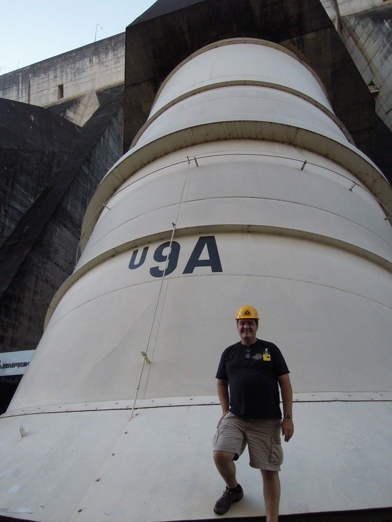 Trey Walters in front of one of the 10 m (33 ft) penstocks   